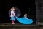 Sandra Devaney Playing with Umbrellas.jpg